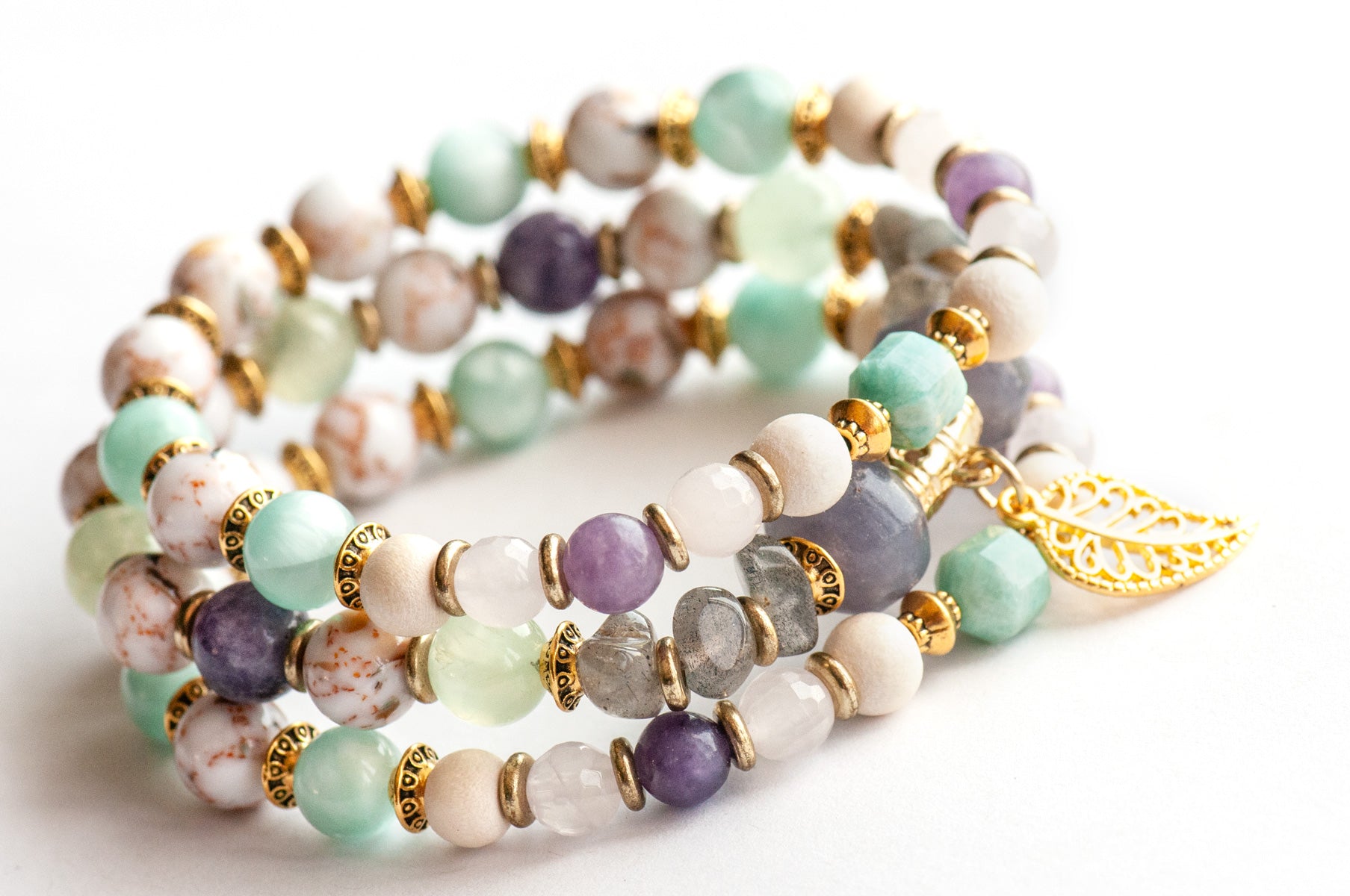 Art Nouveau Lynx bracelet stack featuring Lepidolite, Prehnite, and upcycled shell with gold leaf charm