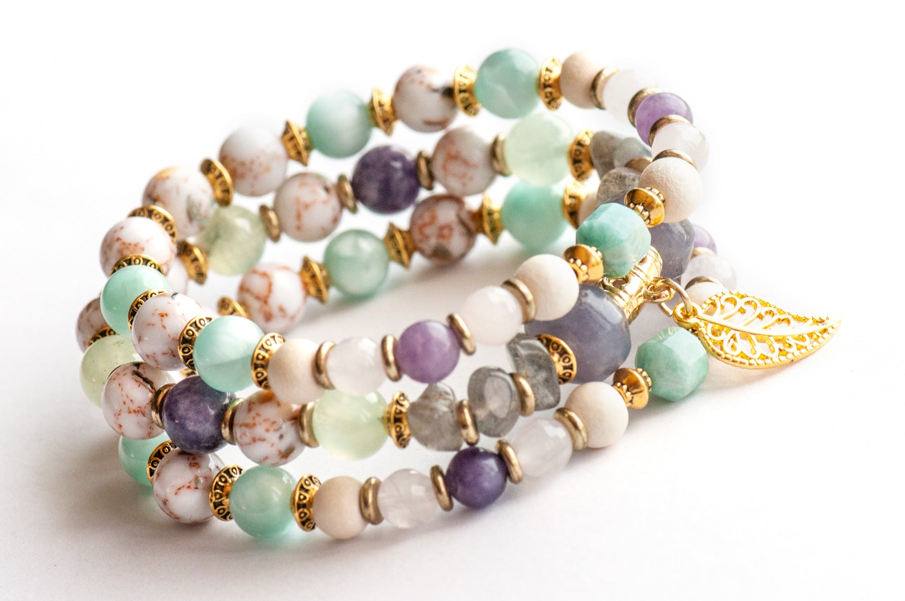 Art Nouveau Lynx bracelet stack featuring Lepidolite, Prehnite, and upcycled shell with gold leaf charm