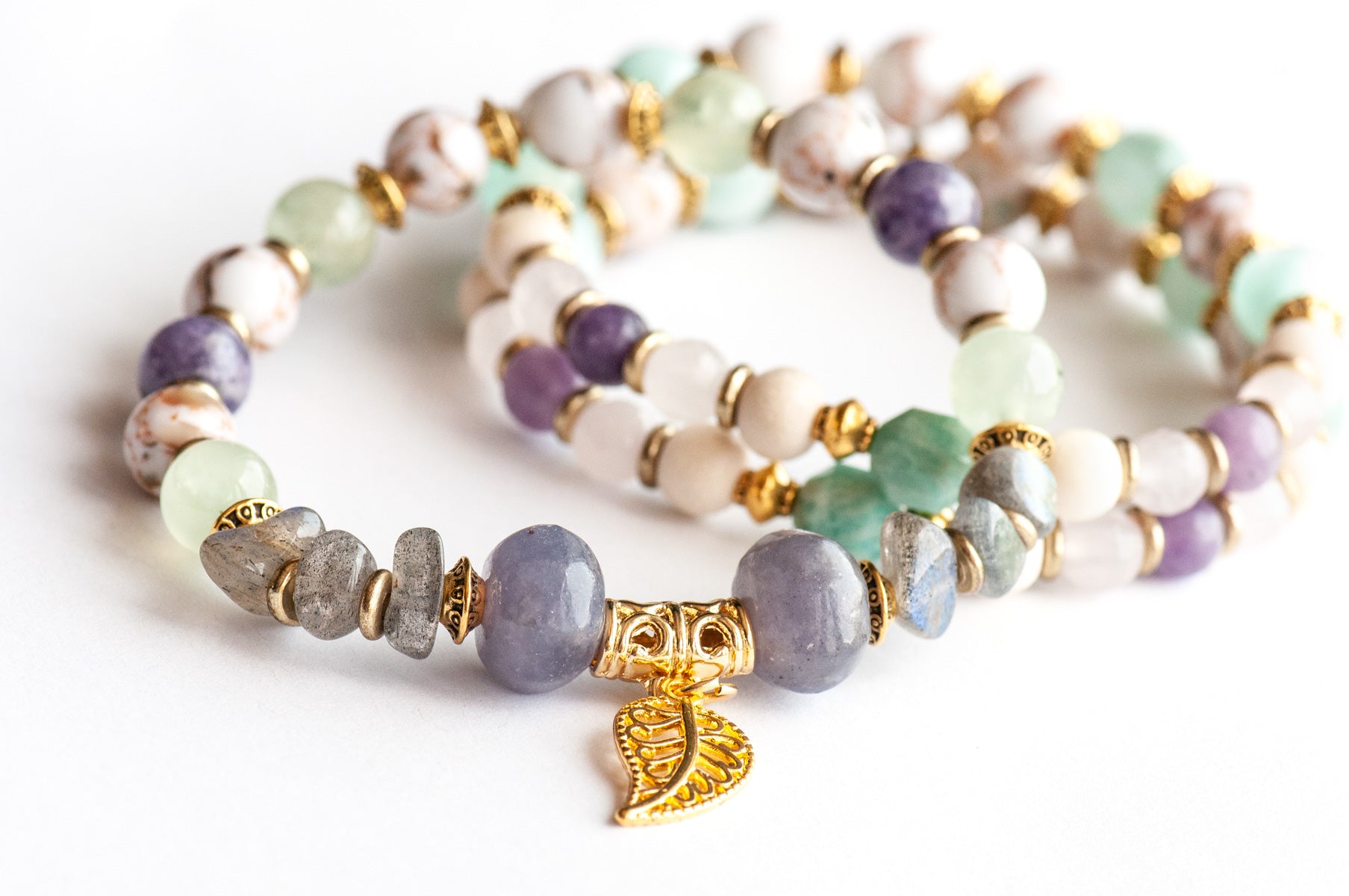 Art Nouveau Lynx bracelet stack featuring Lepidolite, Prehnite, and upcycled shell with gold leaf charm