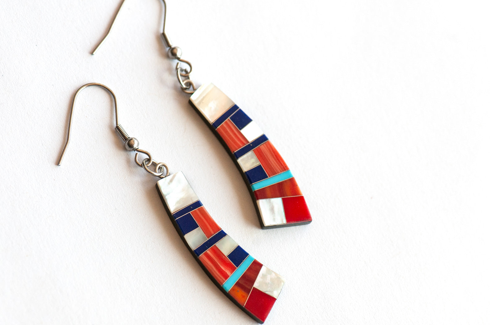 Handmade stone inlay earrings in Coral with pearl & lapis. Unique, artistic, and one-of-a-kind statement jewellery.