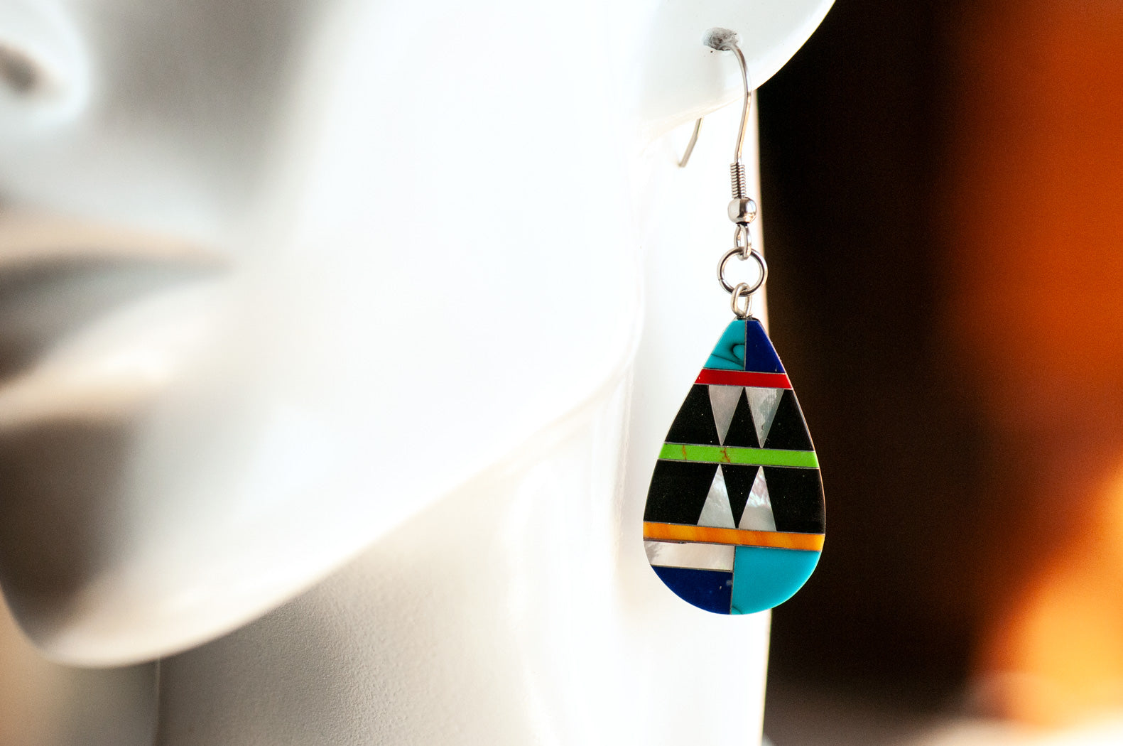 Handmade stone inlay earrings in two variations: turquoise, pearl & coral, or dramatic jet, turquoise & coral. Lightweight, artistic, and one-of-a-kind statement jewellery.