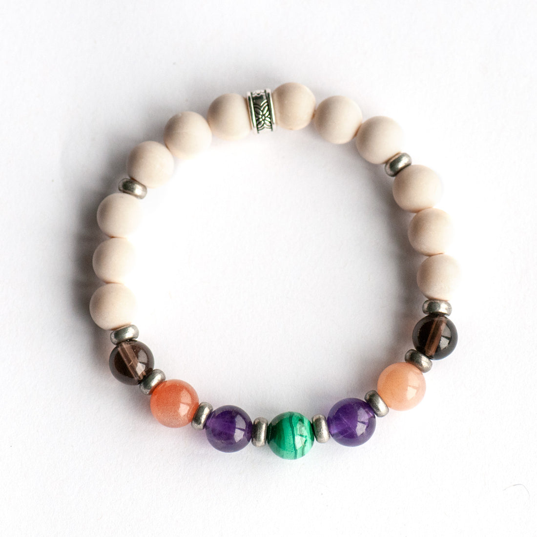 Fierce Ease bracelet with Malachite, Amethyst, Moonstone, and Smoky Quartz on white background