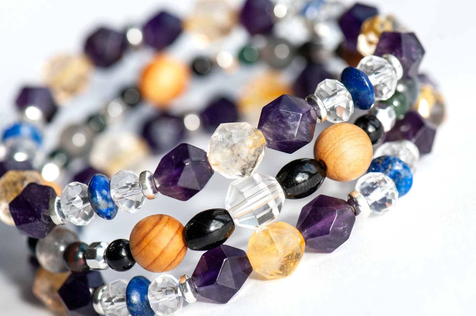 Faceted Citrine, Labradorite flash, and cedar wood detail of Winter Solstice stack