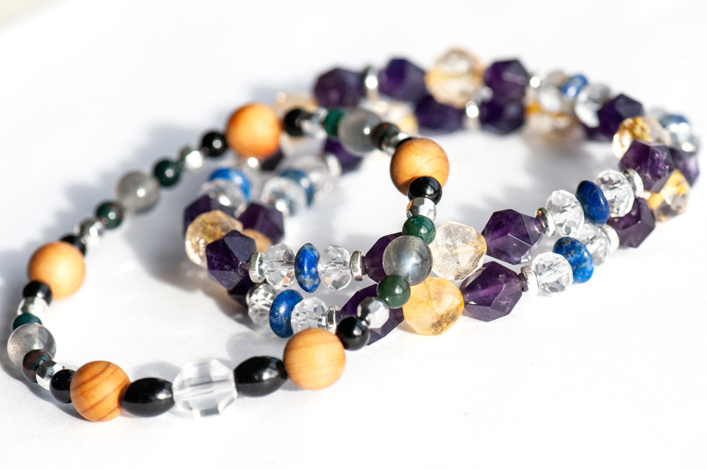 Faceted Citrine, Labradorite flash, and cedar wood detail of Winter Solstice stack