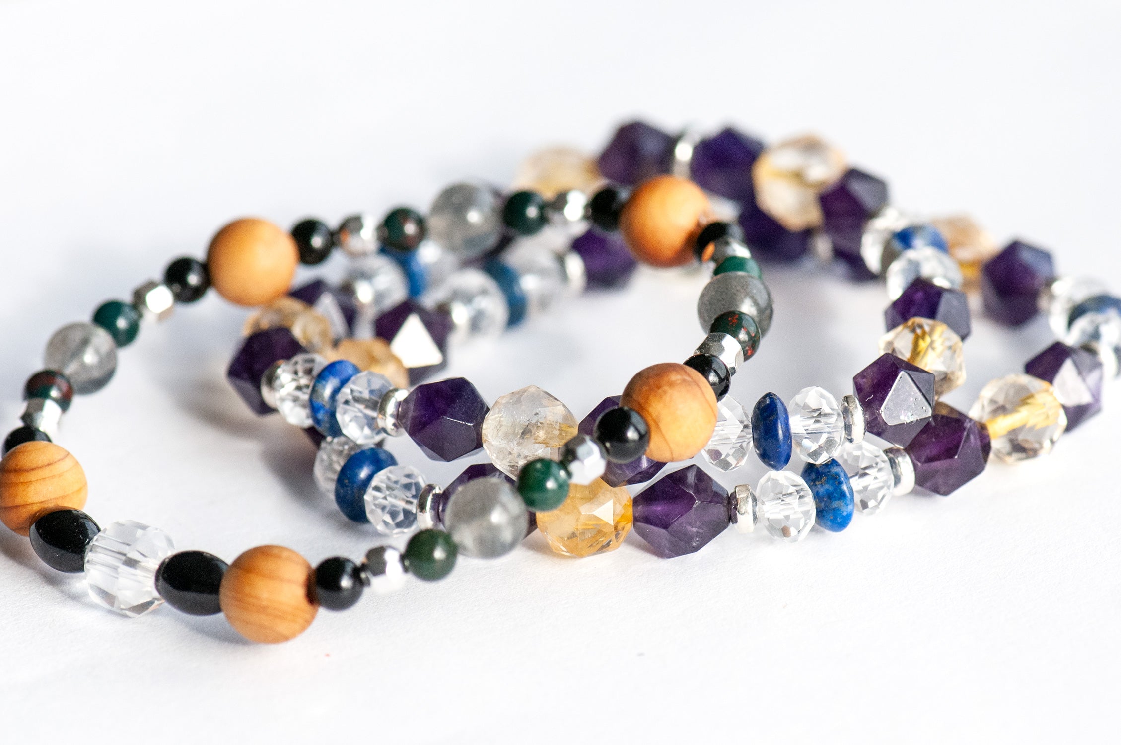 Winter Solstice three-bracelet gemstone set with silver hematite accents