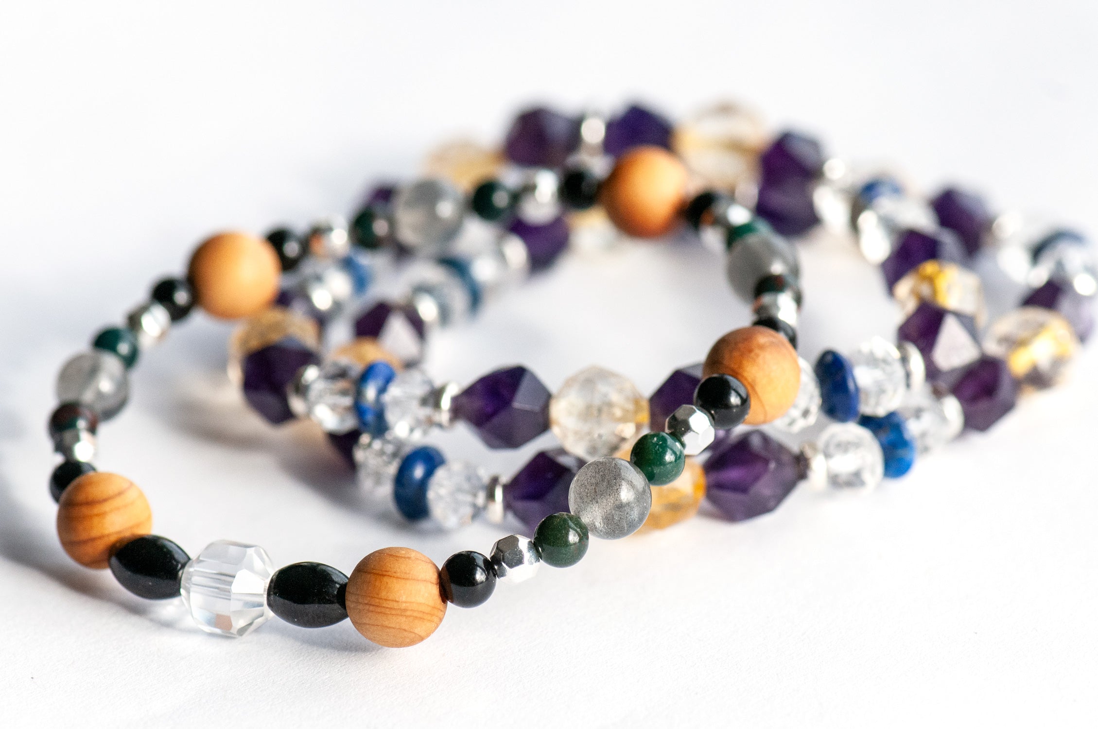 Thuja cedar wood beads and Crystal Quartz prism on Winter Solstice bracelet