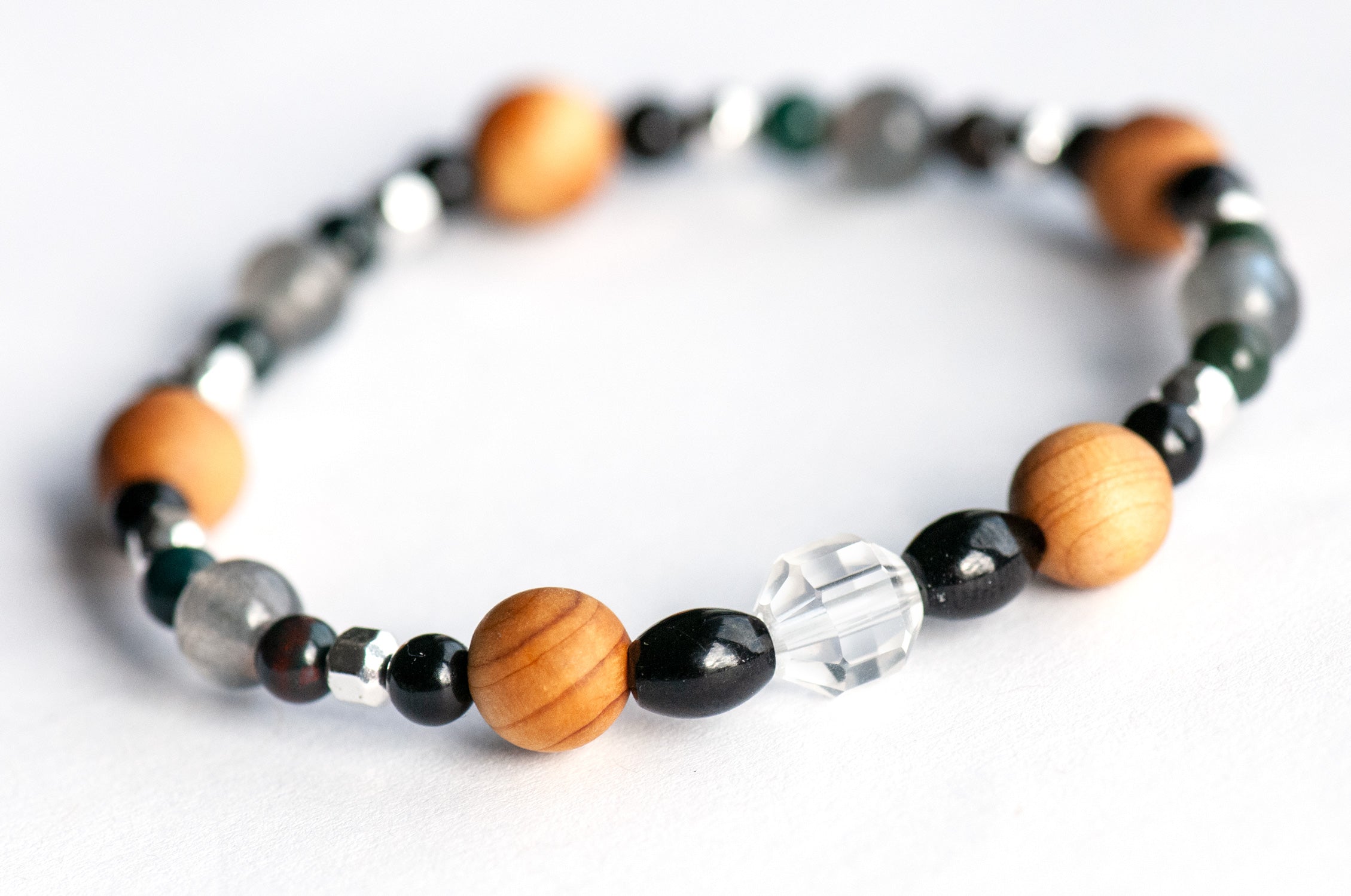 Winter Solstice focal bracelet with Crystal Quartz prism and cedar wood beads