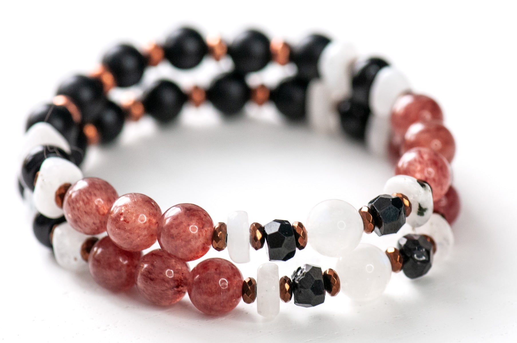 Elegant Japanese cherry blossom inspired bracelet set with moonstone, strawberry quartz, and black spinel