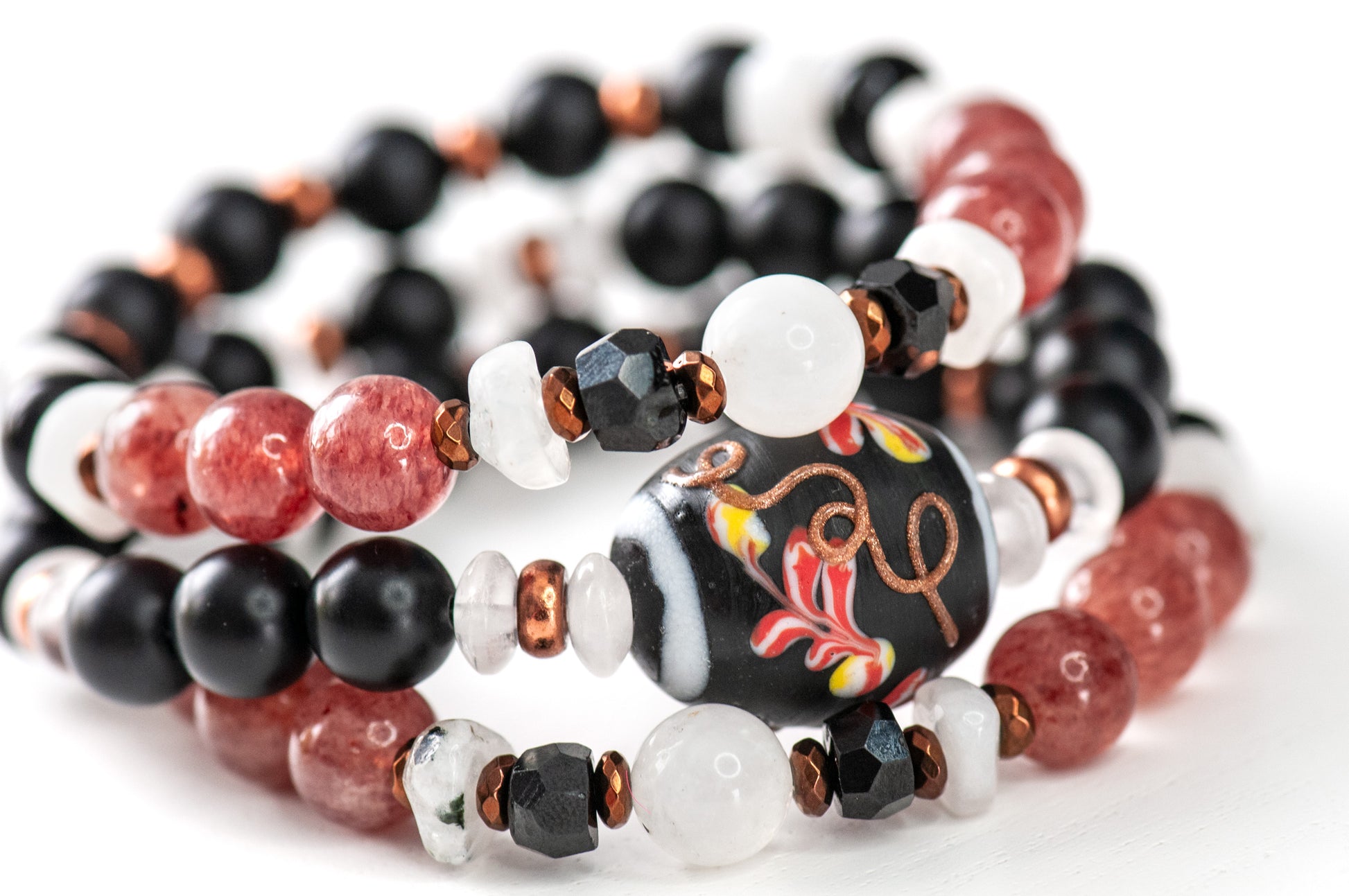 Sakura-inspired Voyage to Kyoto bracelets with moonstone flash, black agate, and copper accents