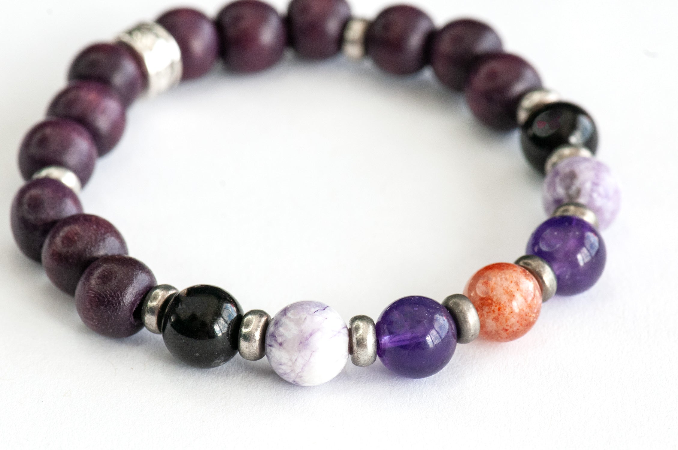 Fierce Safe Passage stretch bracelet with natural gemstones and plum purple wood beads