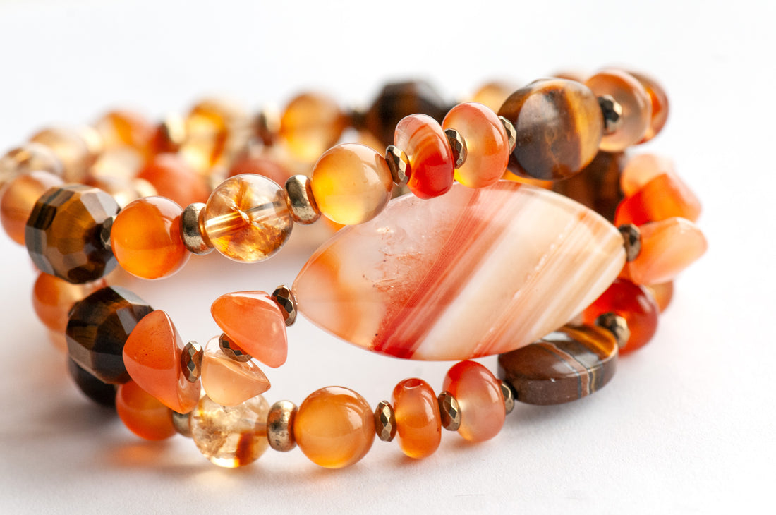 Fierce Fire Elemental bracelet set featuring natural carnelian, tiger eye, citrine, and orange calcite with pyrite-plated hematite spacers