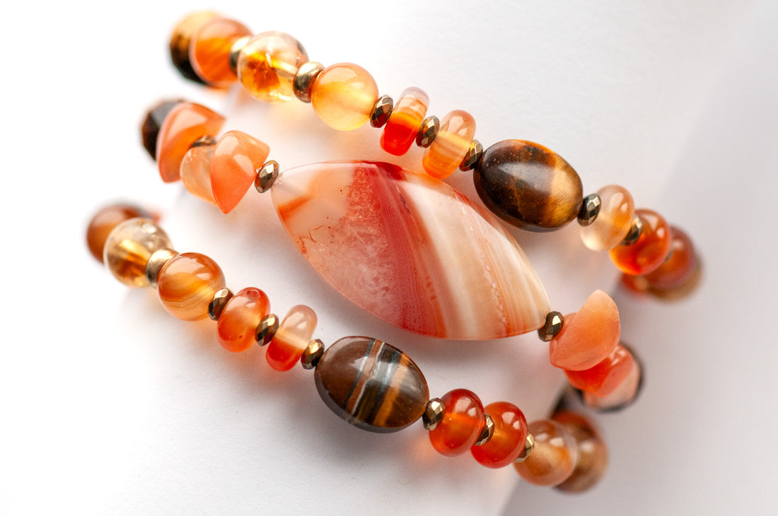 Fierce Fire Elemental bracelet set featuring natural carnelian, tiger eye, citrine, and orange calcite with pyrite-plated hematite spacers
