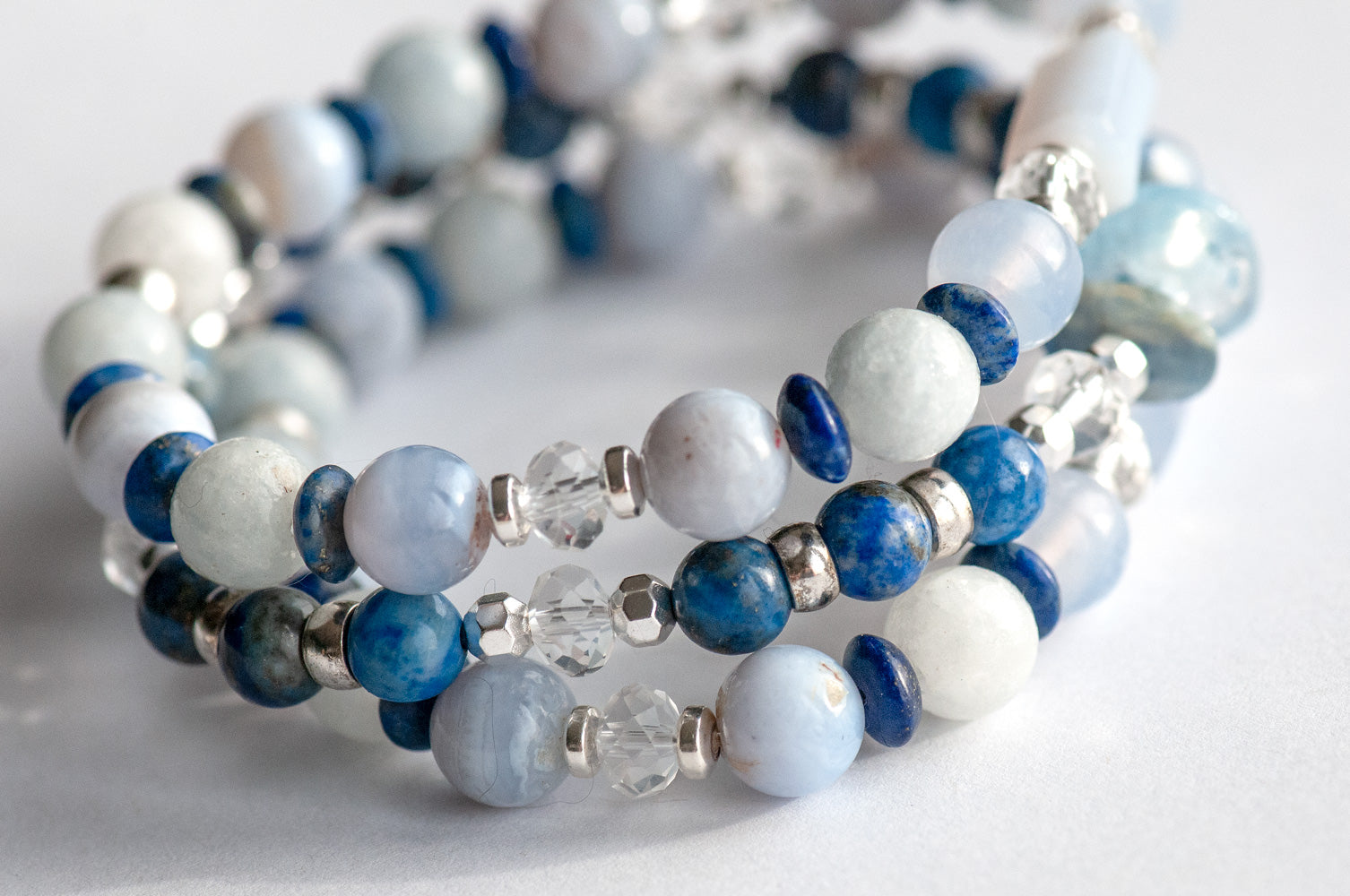 Side view Fierce Air Elemental bracelet set featuring natural blue kyanite, lapis lazuli, blue lace agate, and celestite with silver-plated hematite spacers