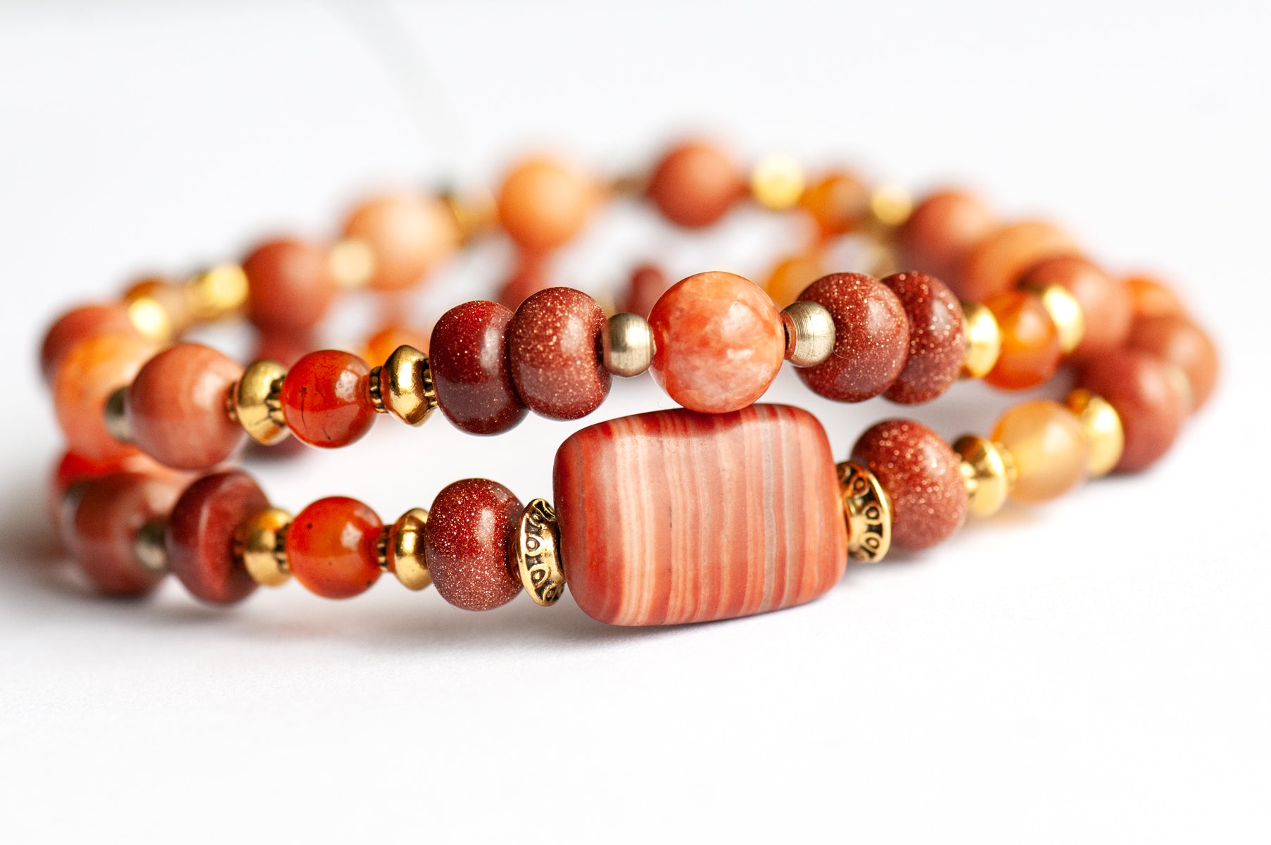 Marigold Bracelet Set: Tiger Jasper, Carnelian & Red Malachite celebrate October's birth flower — fiery warmth and resilience in rust, gold, and ember tones.
