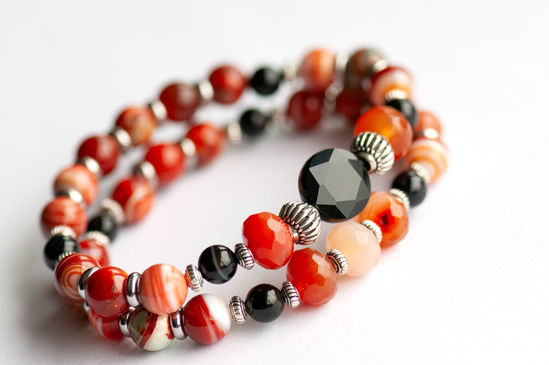 Poppy Bracelet Set: Black Onyx, Red Agate & Flower Poppy Jasper celebrate August's birth flower — bold resilience in deep burnt reds and grounding black.