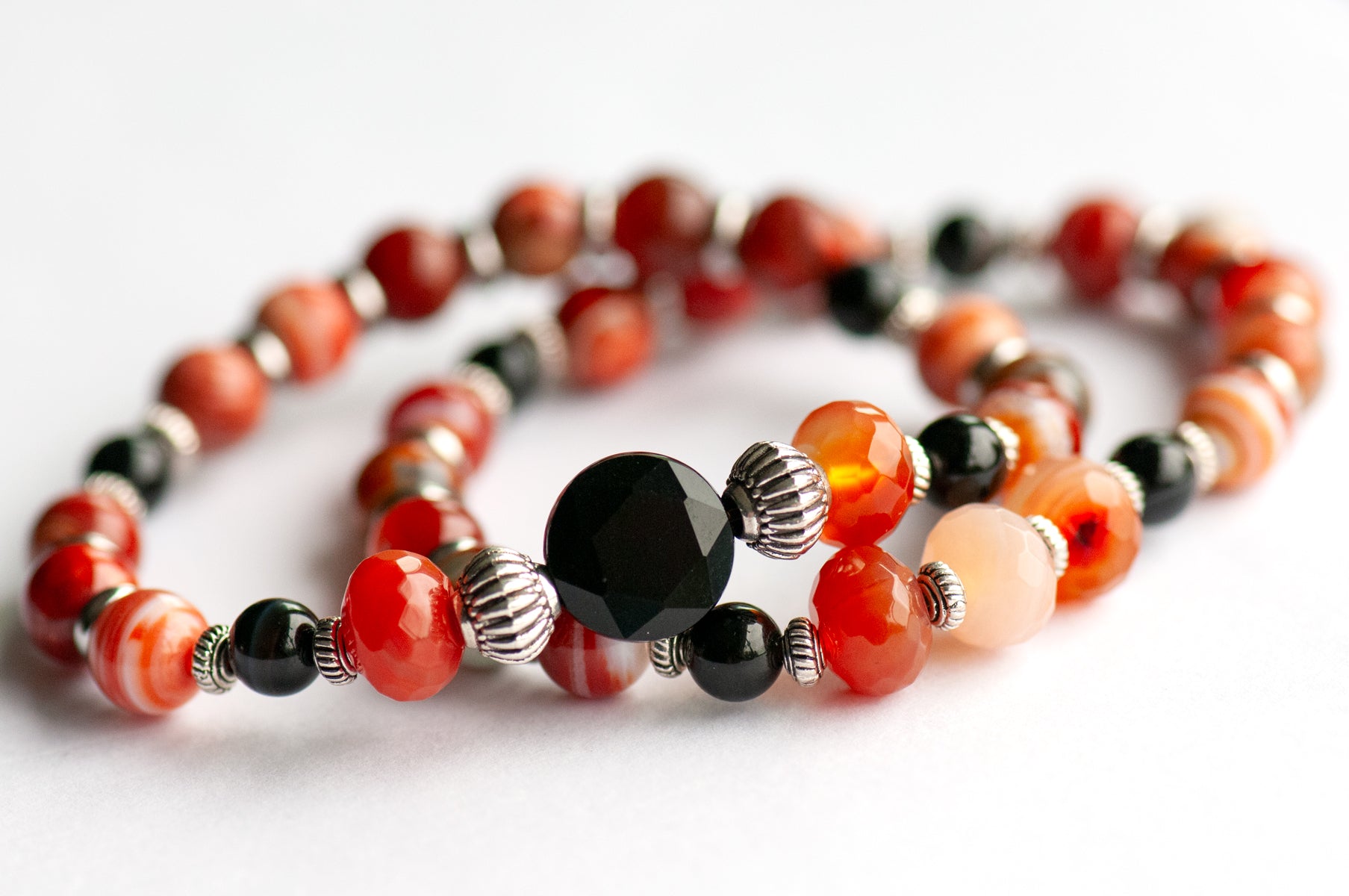Poppy Bracelet Set: Black Onyx, Red Agate & Flower Poppy Jasper celebrate August's birth flower — bold resilience in deep burnt reds and grounding black.