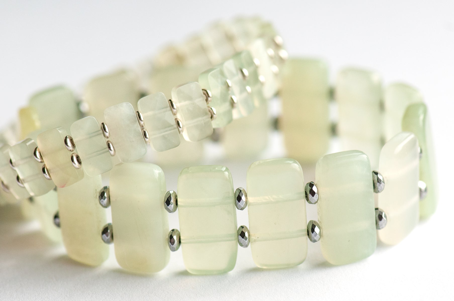 Both styles of Serpentine 'New Jade' cuff bracelets. Handcrafted, ethically sourced gemstone jewellery from New Brunswick, Canada.