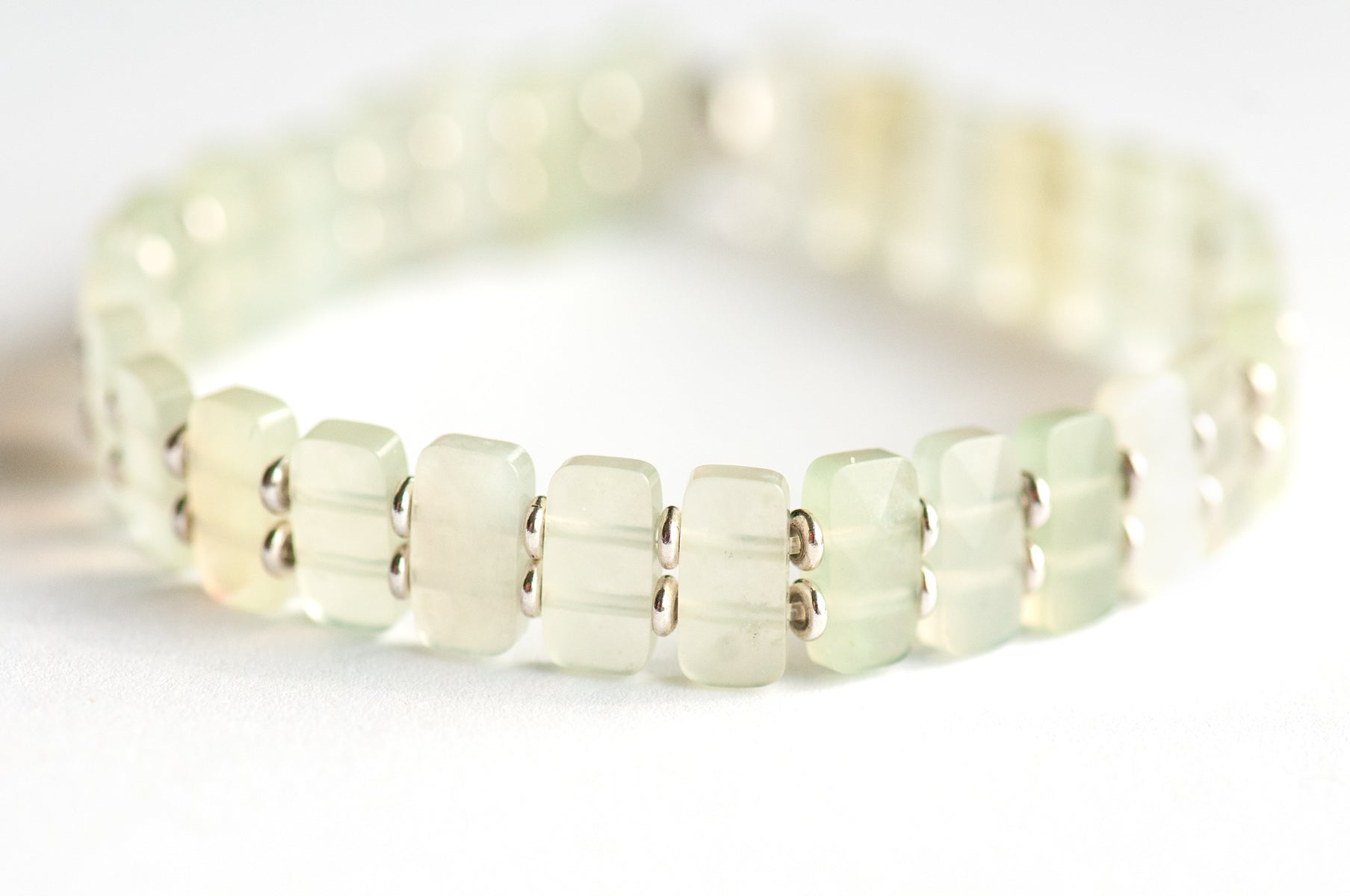 Delicately faceted Serpentine 'New Jade' cuff bracelet with light-catching sparkle. Handcrafted, ethically sourced gemstone jewellery from New Brunswick, Canada.