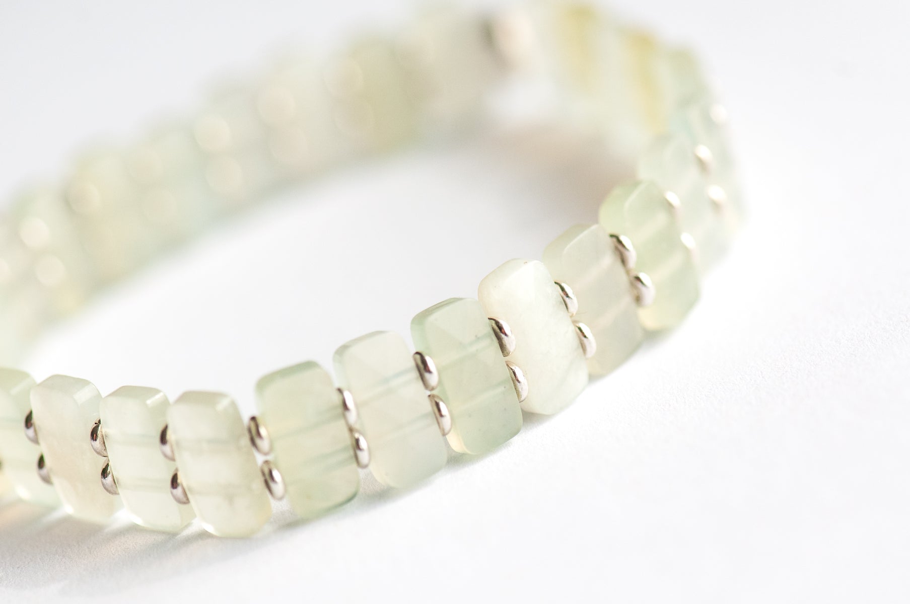 Delicately faceted Serpentine 'New Jade' cuff bracelet with light-catching sparkle. Handcrafted, ethically sourced gemstone jewellery from New Brunswick, Canada.