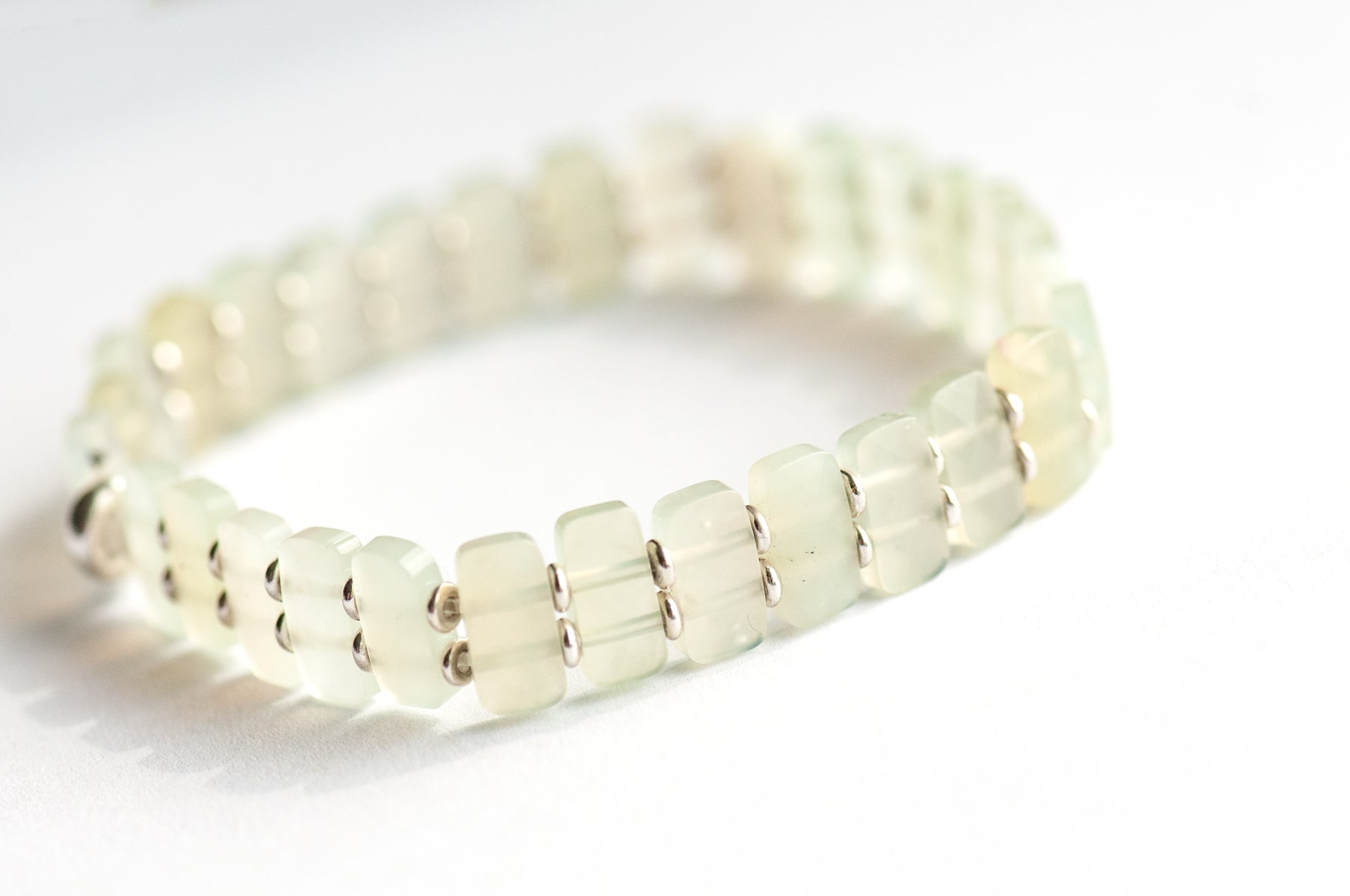 Delicately faceted Serpentine 'New Jade' cuff bracelet with light-catching sparkle. Handcrafted, ethically sourced gemstone jewellery from New Brunswick, Canada.