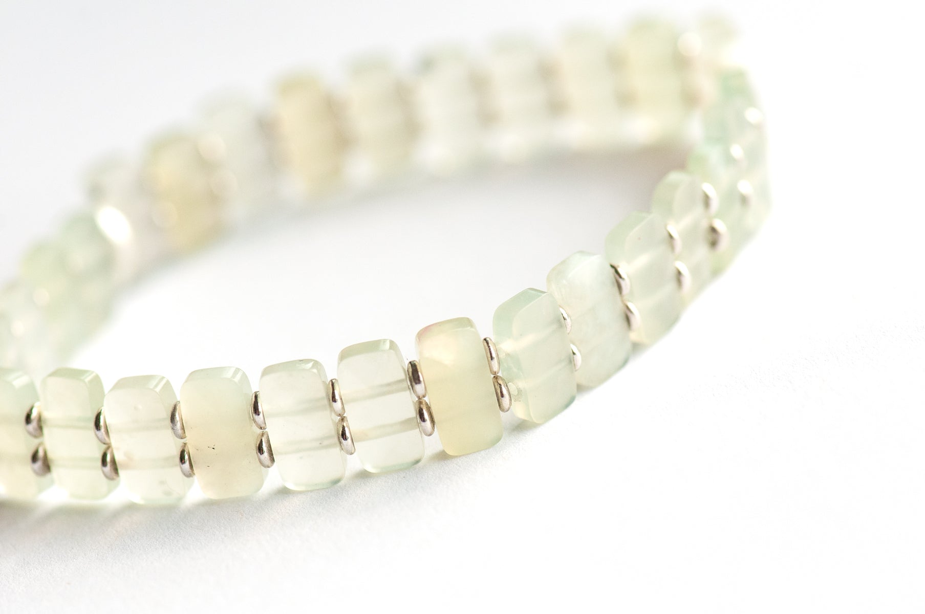 Delicately faceted Serpentine 'New Jade' cuff bracelet with light-catching sparkle. Handcrafted, ethically sourced gemstone jewellery from New Brunswick, Canada.