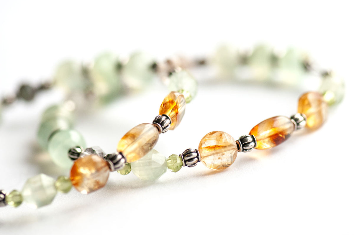 Daffodil focal bracelets with a Citrine rice bead, faceted Citrine coins, Prehnite Energy Prisms framed by Peridot, Lodalite Quartz lanterns and Prehnite rounds