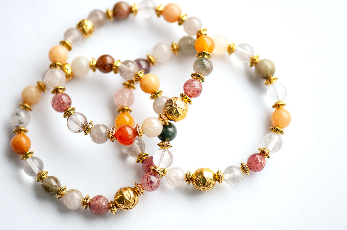 Fierce Multitude - Lodalite Quartz Bracelet featuring two beaded bracelets made of multicolored Lodalite Quartz and antique golden-plated metal spacers.