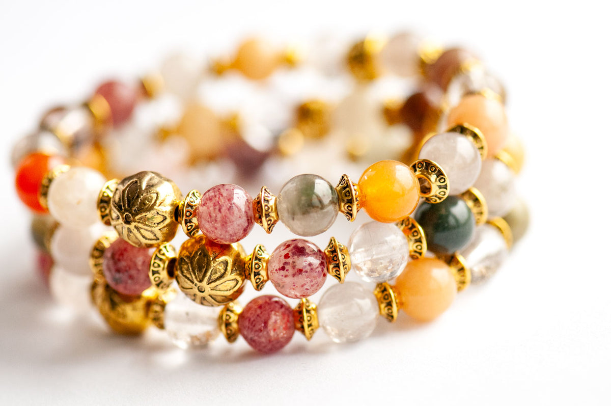 Fierce Multitude - Lodalite Quartz Bracelet featuring multi-strand, round multicolored stone beads interspersed with ornate, antique golden-plated spacers.