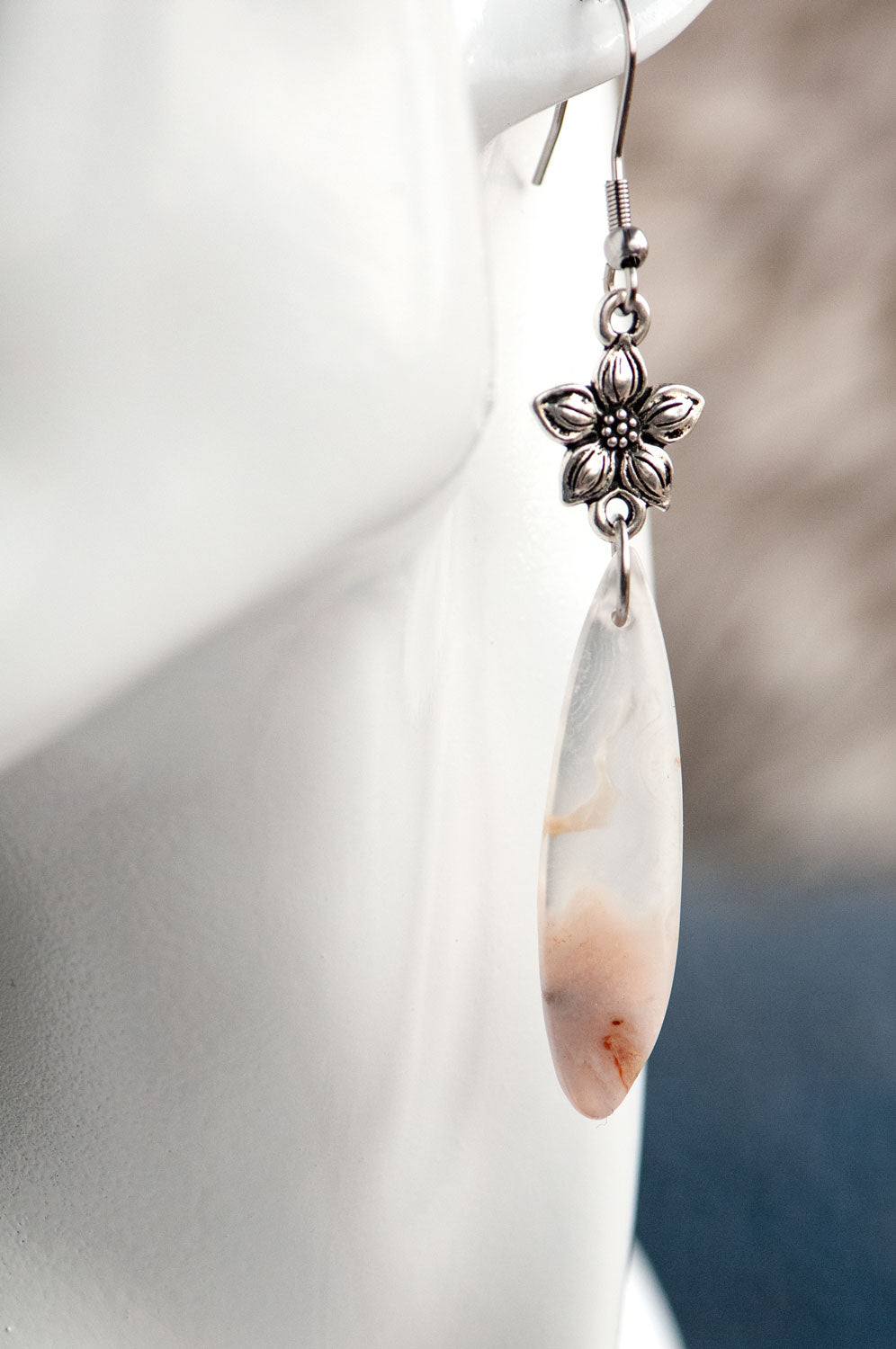 Cherry Blossom Agate earrings worn on the ear, showing their 8 cm total length