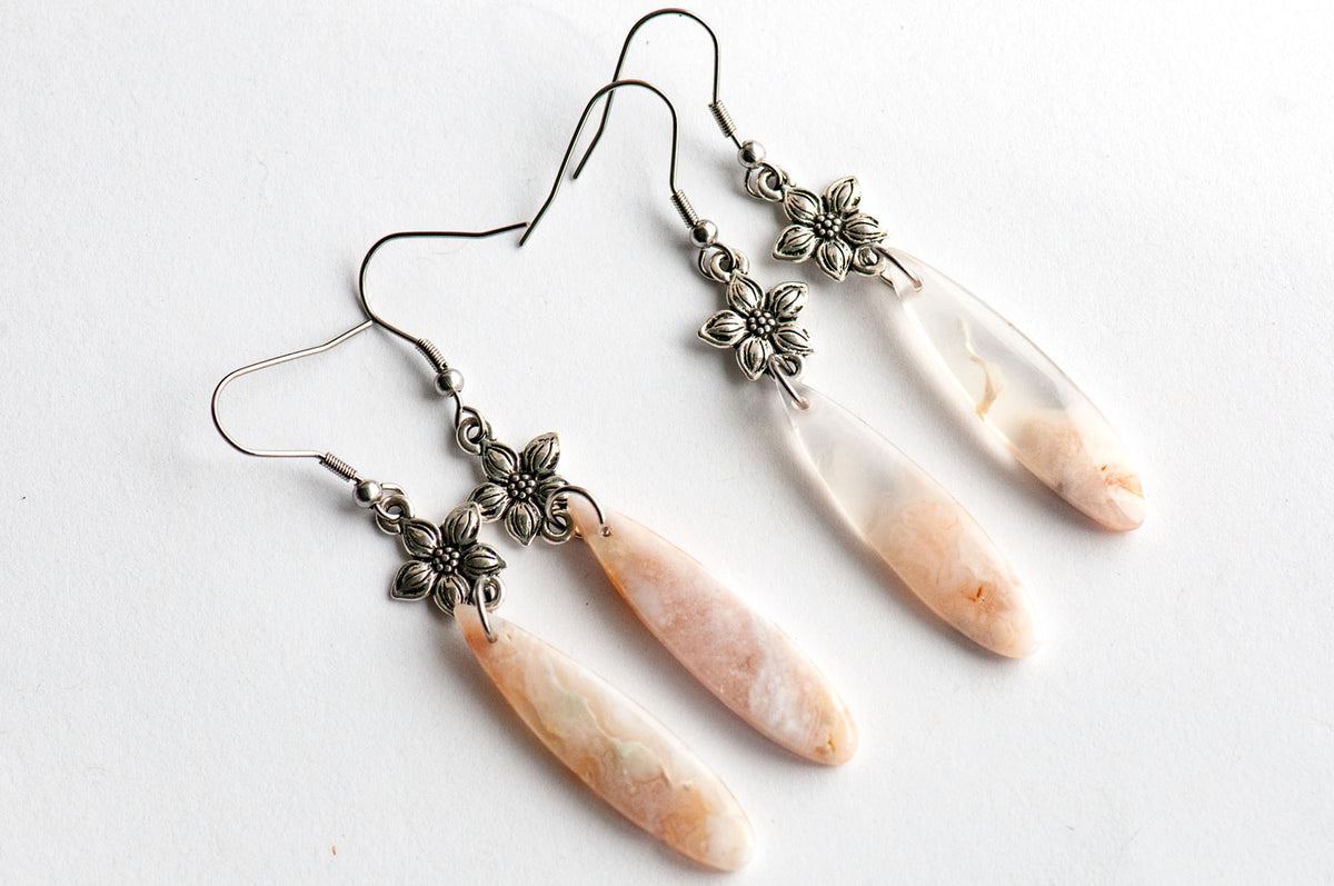 Natural Cherry Blossom Agate teardrop earrings on TierraCast Star Jasmine links, handmade in New Brunswick, Canada