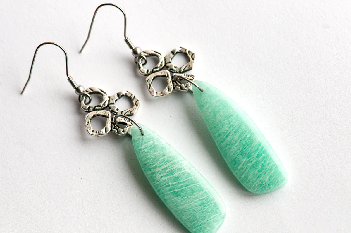 Close-up of a 13 × 38 mm Amazonite fan showing its delicate white veining