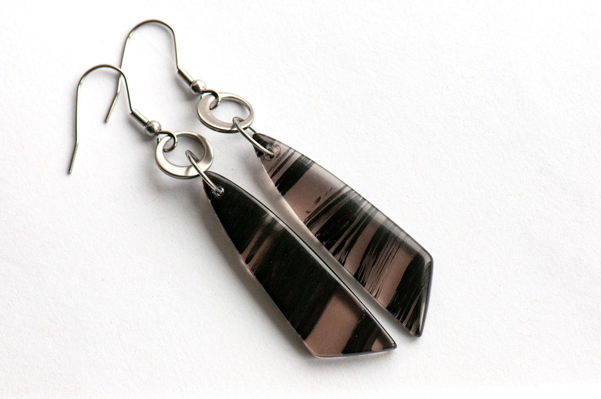 Ice Obsidian wing drop earrings on asymmetrical stainless steel rings, handmade in New Brunswick, Canada