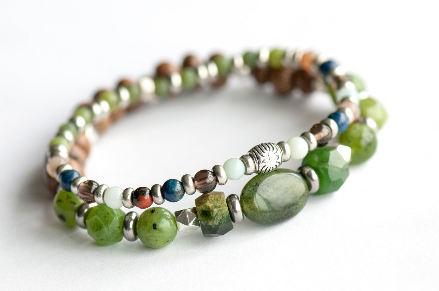 British Columbia Lynx Bracelet Set – Two handmade gemstone bracelets featuring BC Jade, Amazonite, Petrified Wood, and customizable charm options