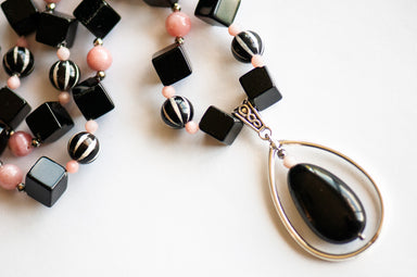 Close-up of 24mm Rainbow Obsidian pendant Necklace with Tibetan Silver Drop