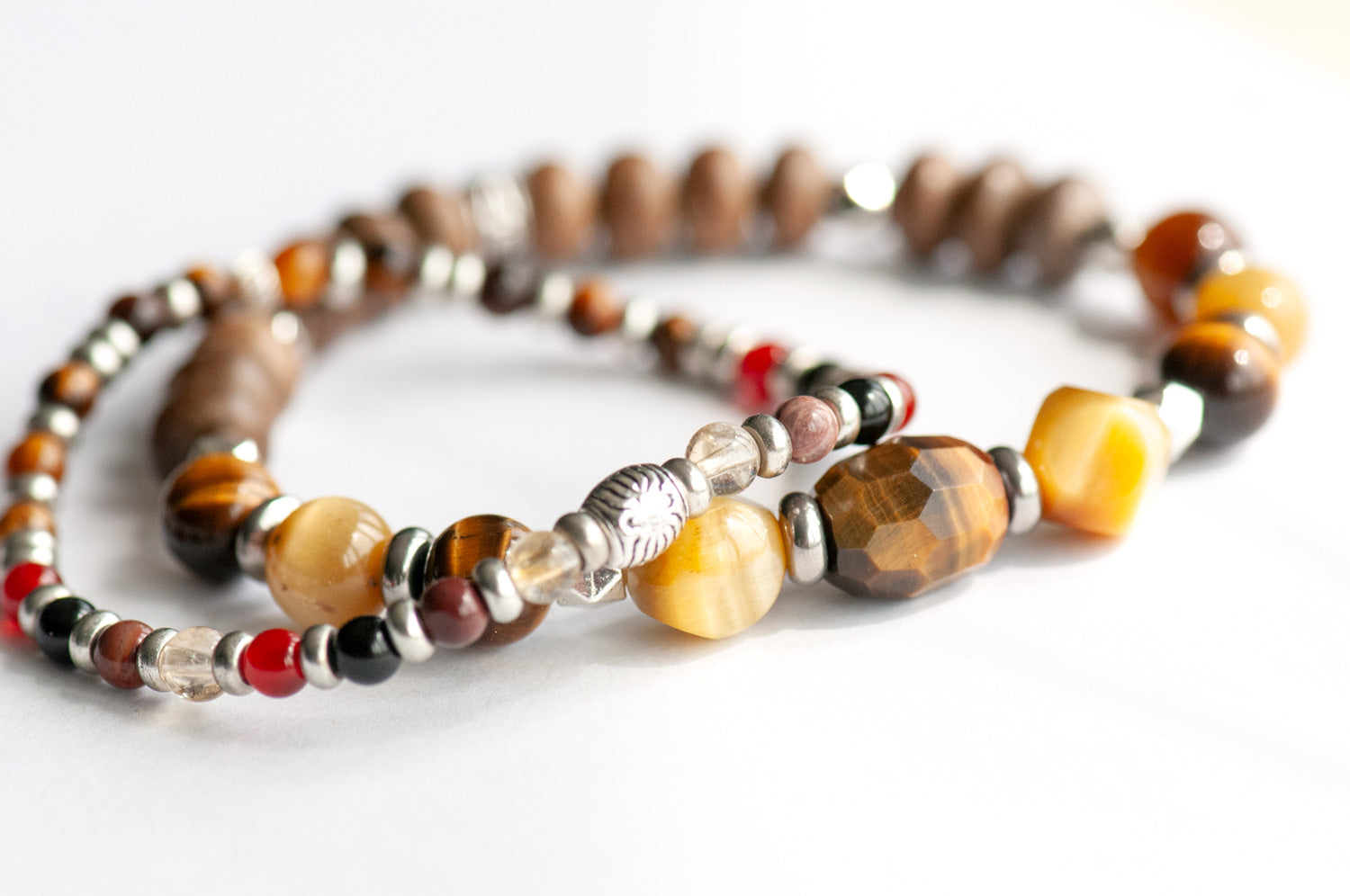 Alberta Lynx Bracelet Set – Two handmade gemstone bracelets featuring Tiger Eye, Carnelian, Mookaite, and customizable charm options