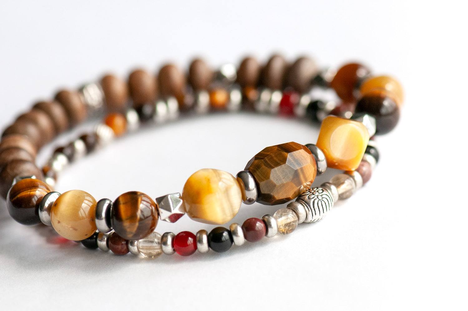 Alberta Lynx Bracelet Set – Two handmade gemstone bracelets featuring Tiger Eye, Carnelian, Mookaite, and customizable charm options