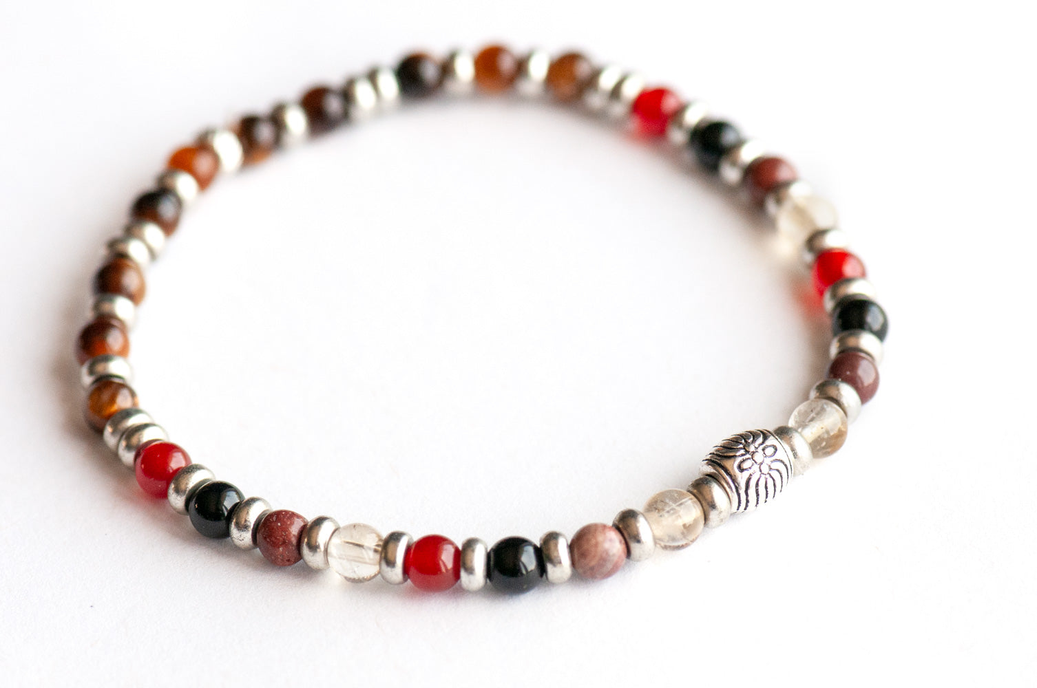 Supporting bracelet from Alberta Lynx Set – 4mm stones with charm, including Carnelian, Sunset Mookaite, Citrine, Black Onyx, and Grey Tiger Eye