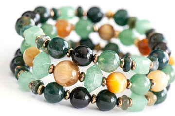 Fierce Earth three-bracelet set featuring Golden Tiger Eye, Green Aventurine, Moss Agate, and Black Flower Tourmaline
