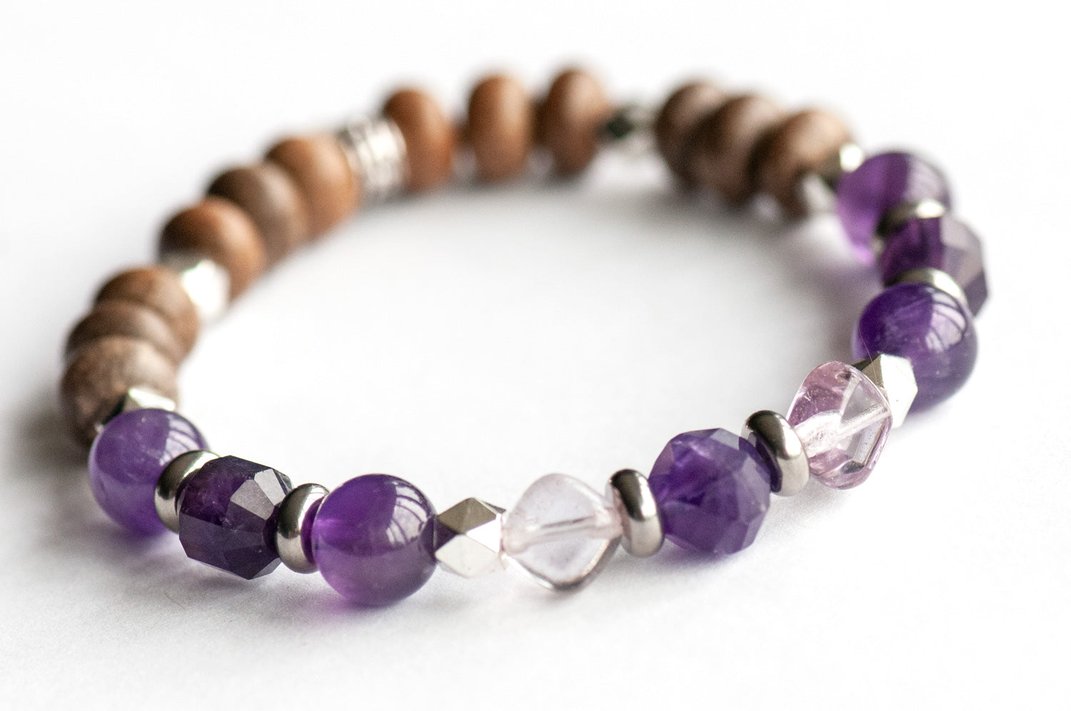 Feature bracelet from Ontario Lynx Set – Faceted Amethyst nugget with Lavender Amethyst squares, Amethyst rounds, prisms, and grey wood beads