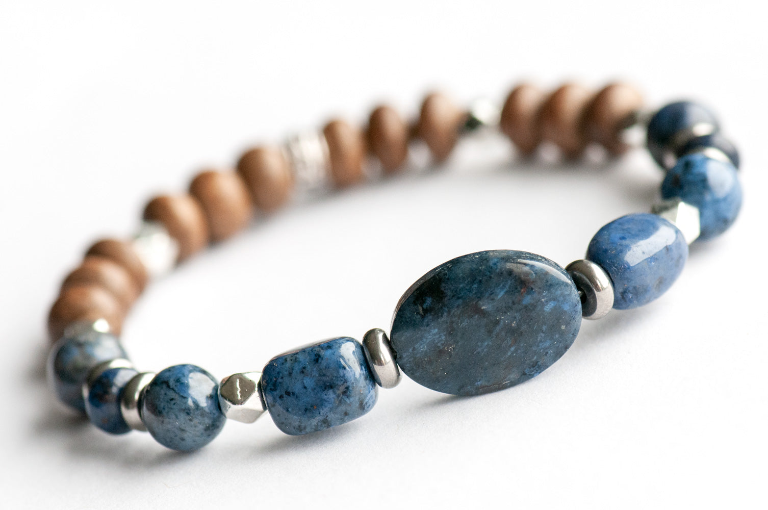 Feature bracelet from Yukon Lynx Set – Dumortierite oval with nuggets, rondelles, and AA-grade rounds, grey wood beads, and silver spacers