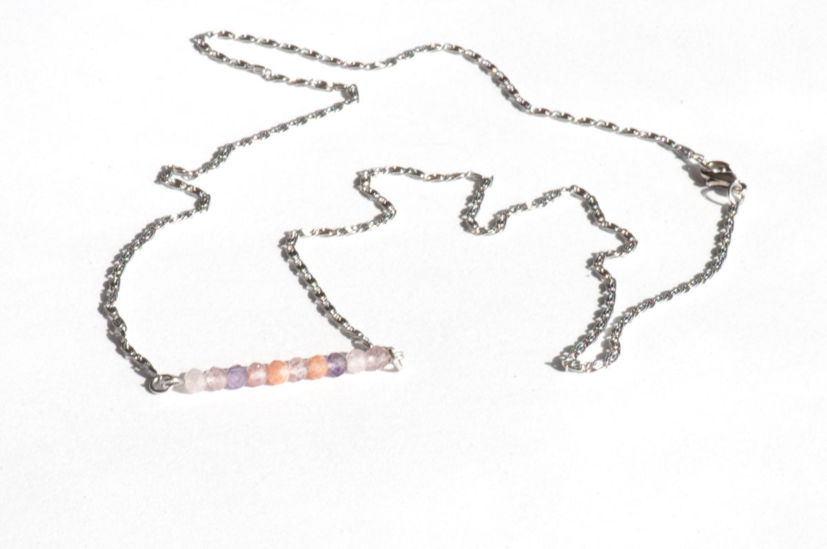Dainty rainbow quartz necklace in peach, pink, and purples, handmade in Canada