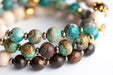 Detail of Handcrafted Chrysocolla beads with Bronzite and Jasper bracelet set