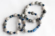 Handmade gemstone bracelet set with lapis and Eagle eye stone in blue and grey