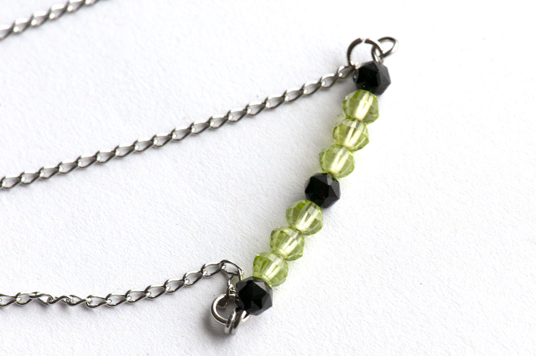 August birthstone necklace with peridot and spinel
