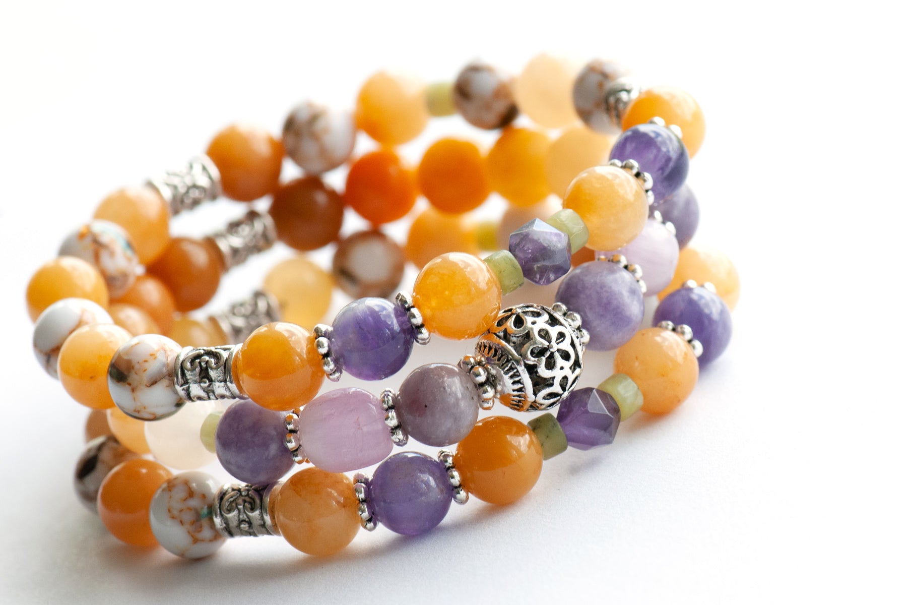 Lavender & Saffron gemstone bracelet handmade in New Brunswick Canada featuring Jade, Lepidolite, Kunzite and Amethyst