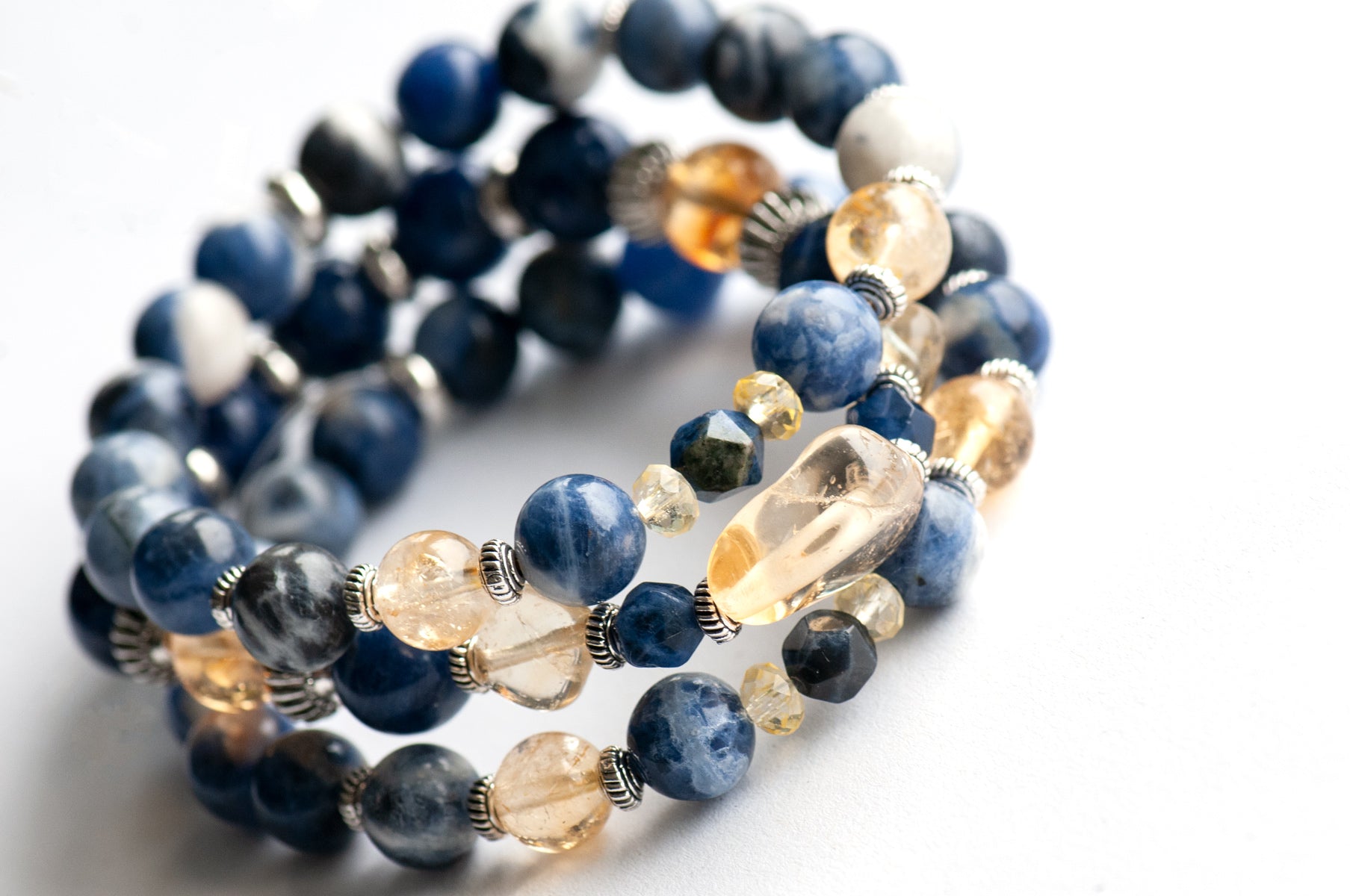 Blue and yellow stone bracelet set featuring sodalite and citrine