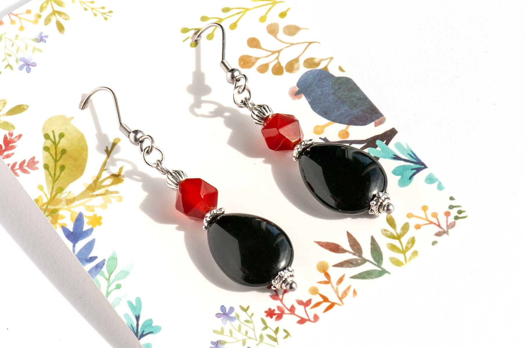 Handmade dangle earrings with red carnelian and black obsidian gemstones