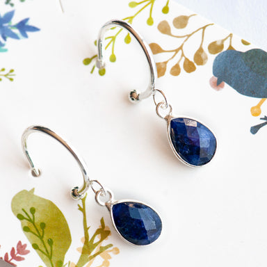 Shimmer and shine your way through day or night with these dainty Sapphire stud hoop earrings handmade in New Brunswick, Canada. 