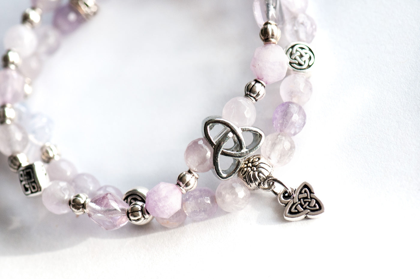 Trinity bracelet with celtic knotwork beands in lavender amethyst handmade in canada
