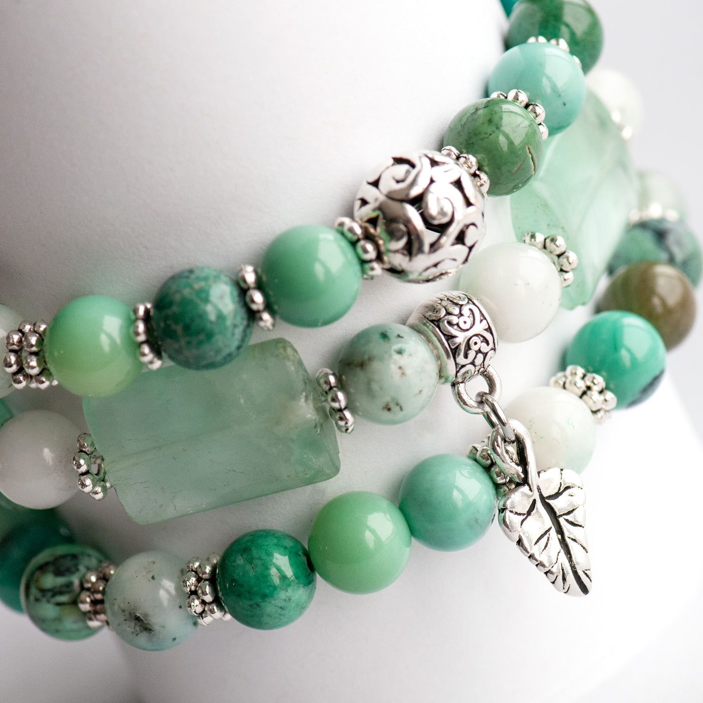 Handmade gemstone bracelet set with fluorite, green agate, and quartz beads